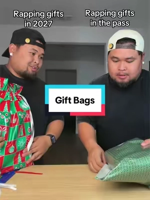 He thought he can wrap gifts faster than me 🤣  #giftwrapping #GiftWrapper #christmaswrapping #christmasbags 