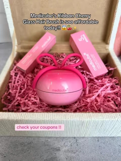 This viral compact brush has multi-length soft bristles designed to gently detangle, smooth frizz, and leave hair looking shiny-plus the adorable ribbon design and protective cover make it perfect for your bag. #Medicube #medicubehairbrush #KoreanHairCare #scalpbrush #haircareroutine 