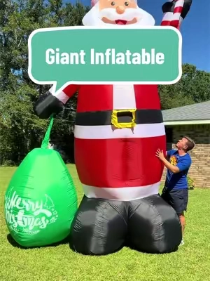 Giant Santa yard inflatable with an electric blower and illuminated design for creating a bold Christmas display outside the home. #fallpicks #tiktokshopstockup #InflatableSanta #ChristmasYardDecor #HolidayDecor 