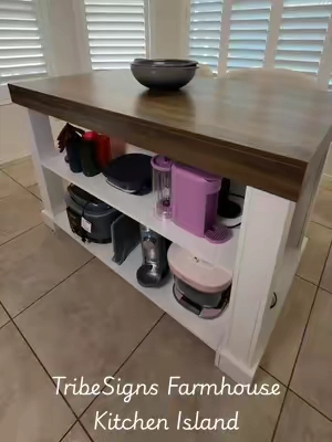 IT’S FINALLY BACK! 🚨🪵✨ I promised I’d keep you updated the second the Tribesigns 55-inch Farmhouse Kitchen Island restocked… well, here you go! 🙌 If you missed the last drop, this is your heads-up before inventory wipes out again. This is a true full-size stationary island—no cheap rolling wheels, just solid, heavy-duty durability. You get 55 inches of stunning rustic brown countertop and 3 deep tiers of storage to clear the clutter and take your kitchen organization to the next level. 🥐☕️ Quick Restock Breakdown:  55" Long Surface: Massive prep space for baking, cooking, or a full coffee station 🥗  Rock-Solid Frame: Stationary build that feels like a built-in custom piece 🏗️ #kitchenisland #kitchenstorage #farmhousekitchen #farmhousedecor #tiktokshopcreatorpicks 