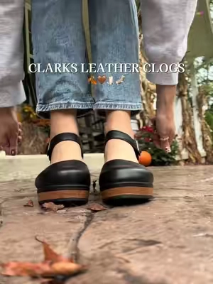 These Clarks clogs are giving vintage ’70s/’80s fall in the BEST way 🤎🍂 The closed-toe silhouette, adjustable Velcro strap + statement heel make them feel so retro but still incredibly wearable. Beautiful quality leather that you can dress down with jeans and an oversized sweater or dress up with trousers and fall dresses. Such a good fall shoe when you want cute AND comfortable. #Clarks #ClarksClogs #LeatherClogs #FallShoes #FallStyle 