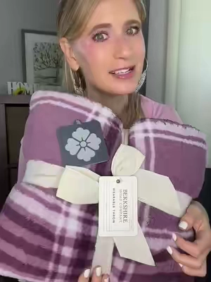 Berkshire took cozy to the next level! ☁️ This double-sided Sherpa wearable throw is SO soft and warm—and it makes such an easy, cozy gift with the bow + to/from tag already included! 🎀🎁 Perfect for chilly fall + winter nights. 🍂❄️ #wearableblanket #blanket #berkshire #gifting @QVC, Inc #qvcloyaltyprogram