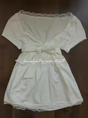 She’s so coquette and chic 🦢🍂✨ Perfect for layering in the fall and winter!  Low stock grab while you can! #falloutfits #babydolltop #chicaesthetic #2000s #coquette bella swan outfit inspo Elena Gilbert tight top y2k coquette elegant 