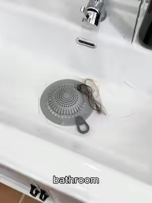 cheaper than dealing with a clogged shower drain 🚿 this little thing catches all that loose hair before it gets into your pipes #haircatcher #cloggeddrain #showerhack #cleaninghack #CleanTok 