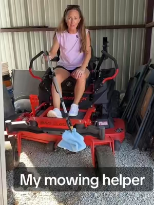 This grabber tool lets me pick up trash and sticks without ever getting off the mower. #GrabberTool #YardWork #MowingHack #mowingthegrass #yardwork 