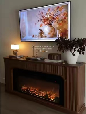 i couldn’t have a built-in fireplace on my wall, so i found this tv stand with a fireplace, and i’m honestly obsessed 🤎 the quality is amazing, and it’s even more beautiful than i imagined! #tvstand #tvstandwithfireplace #fireplace #homefinds #fireplacedecor 