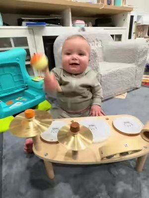 Dakota having fun with her wooden music drum set! #toddlertoys #babytoys #musicaltoys #woodentoys #mommusthaves 