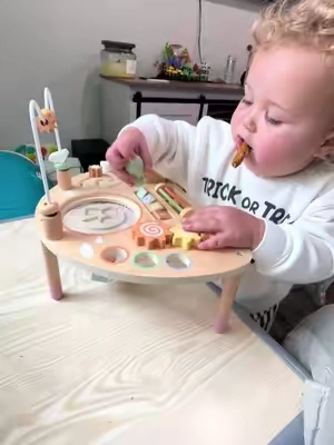 We have used this Montessori activity table pretty regularly since she was 6 months old. Great toy with longevity! #toddleractivity #babytoy #toddlertoys #montessoritoys #learningtoys 