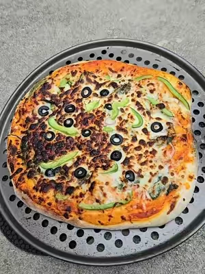 Upgrade your backyard pizza night with this 16-inch multi-fuel pizza oven that hits over 1100°F and bakes stone-fired pizzas in 90 seconds. Featuring a built-in door thermometer, flame viewing window, and foldable legs for easy setup, it delivers authentic wood-fired flavor right at home. #pizzaoven #outdoorcooking #woodfiredpizza #backyardpizza #pizzalover
