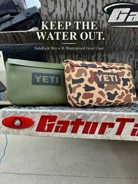 YETI SideKick Dry 3L Waterproof Gear Case keeps your essentials dry for days on the water. Magnetic closure, attachment straps, and more color options to choose from. #YETI #SideKickDry #BoatEssentials #FishingGear #OutdoorGear