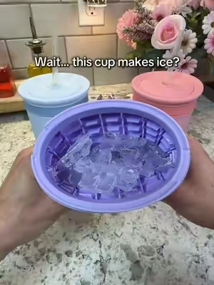 🧊🥤 This freezer cup makes its own mini ice cubes right inside the cup. Just add water to the outer cup, insert the stainless steel tumbler, freeze it, then squeeze to release the ice straight into your drink. Such a fun way to keep iced coffee, soda, lemonade and more extra cold. #IceMakingCup #MiniIceCubes #FreezerCup #IcedCoffee #KitchenGadgets   ice making cup Cup that makes its own ice freezer cup mini ice cube maker crushed ice cup ice cube tumbler portable ice maker cup stainless steel tumbler iced coffee cup cold drink cup kitchen gadgets summer drink accessories
