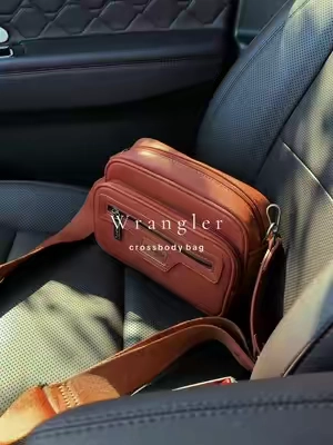 The perfect crossbody! 🤎 @Rustic Charm Bootic #purse #wranglerpurse #crossbodybag 