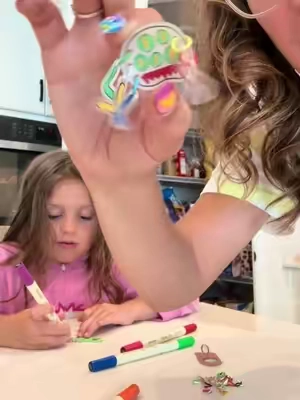 Do you remember Shrinky Dinks from when we were kids?! 🎃 This is the Halloween edition, and it’s even better! Color your designs, pop them in the oven for just 2 minutes, and watch them shrink into adorable keychains, pins, and more! My girls and I spent an hour at the counter making these, and we had the BEST time! 🧡 #ShrinkyDinks #HalloweenCrafts #KidsActivities #CraftingWithKids #HalloweenFun