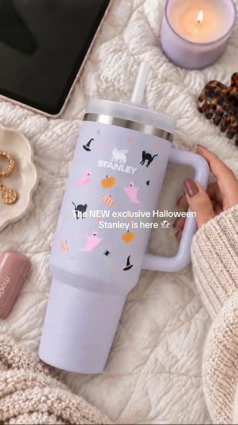Pink ghosts, black cats, and the prettiest purple. I’m obsessed with this Halloween release 🩷 #StanleyCup #HalloweenStanley #PurpleDust #SpookySeason #HalloweenFinds
