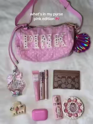 the cutest duffle pink 💕 she might be small but she packs a ton #pink #dufflebag #minibag #bag #whatsinmybag 