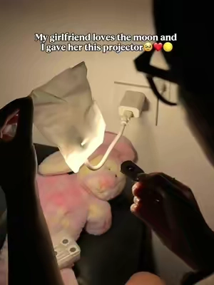 She loves looking at the moon😊 #galaxy #ambientlighting #giftideas #night #starprojector 