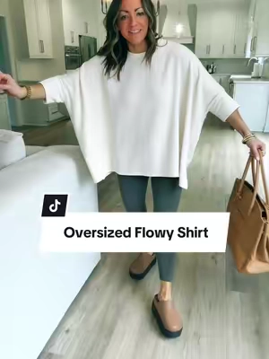 The drape is perfection 🤌🏼 I’m 5’2” 130 in a regular! #leggingsoutfit #oversizedshirt #flowyshirt #modestfashion #elevatedbasics @Discount Divas Boutique 