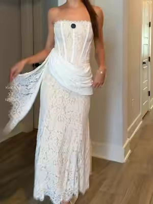 The details on this lace dress make it look like a designer piece. Perfect for brides or any formal event.  #brides #2026bride #2027bride #whitedress #bridal 