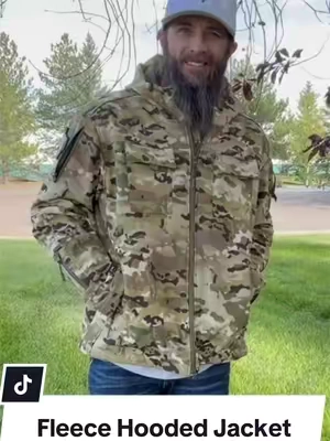 This fleece hooded jacket is loaded with pockets and built for the outdoors. Comfortable, functional, and that camo looks clean.  #OutdoorGear #MensJacket #TacticalGear #CamoJacket #ColdWeatherGear