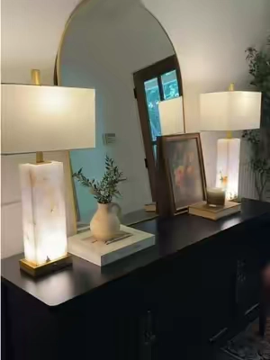 Replying to @Tara Holley These marble lamps are stunning lit all the way up, but the separate illuminated base is what makes them feel so special. The prettiest soft glow for cozy evenings at home✨#lamps #tablelamp #entrywaydecor #nightstand #homedecor 