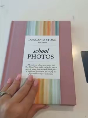 The easiest way to keep every school picture from preschool to graduation 🥹 no more wondering where you put those school pictures! 😅 #momhack #typebmom #schoolpictures #mommusthaves 