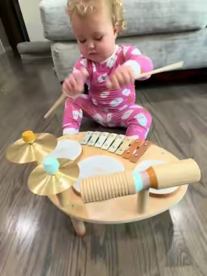 Dakota playing some tunes on her kids drum set! Music to my ears 🤣 #toddlertoys #musicaltoys #kidsdrumset #woodentoys #toddleractivities 