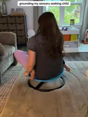 His new favorite chair 🤪 #sensorytoy #swivelchair