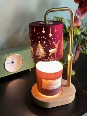 Christmas ambiance without even lighting the candle. 😍🎄🕯️ This little Christmas candle warmer lamp has the cutest holiday shade, adjustable height AND a timer—so it’s functional but also looks like part of the Christmas decor. This is exactly the kind of thing I want glowing in my house all December. ✨ #ChristmasCandleWarmer #CandleWarmerLamp #ChristmasDecor #CozyChristmas #HolidayHomeDecor