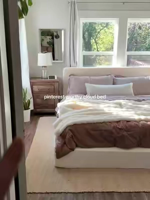 If you want that expensive-looking bedroom without spending a ridiculous amount, this is the move ☁️🤍 #cloudbed #bedroomdecor #bedroommakeover #affordablehome #tiktokshopfalldealsforyou  cloud bed frame, cloud bed, affordable bed frame, luxury bedroom on a budget, cozy bedroom decor, upholstered bed frame, bedroom makeover, affordable bedroom furniture